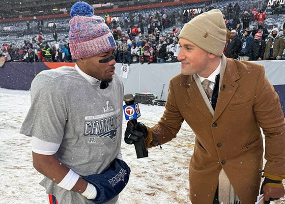 Morey Hershgordon interviews football player.