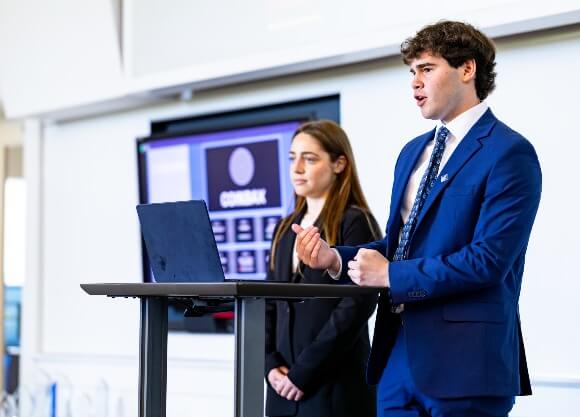 Students presenting The Agency work