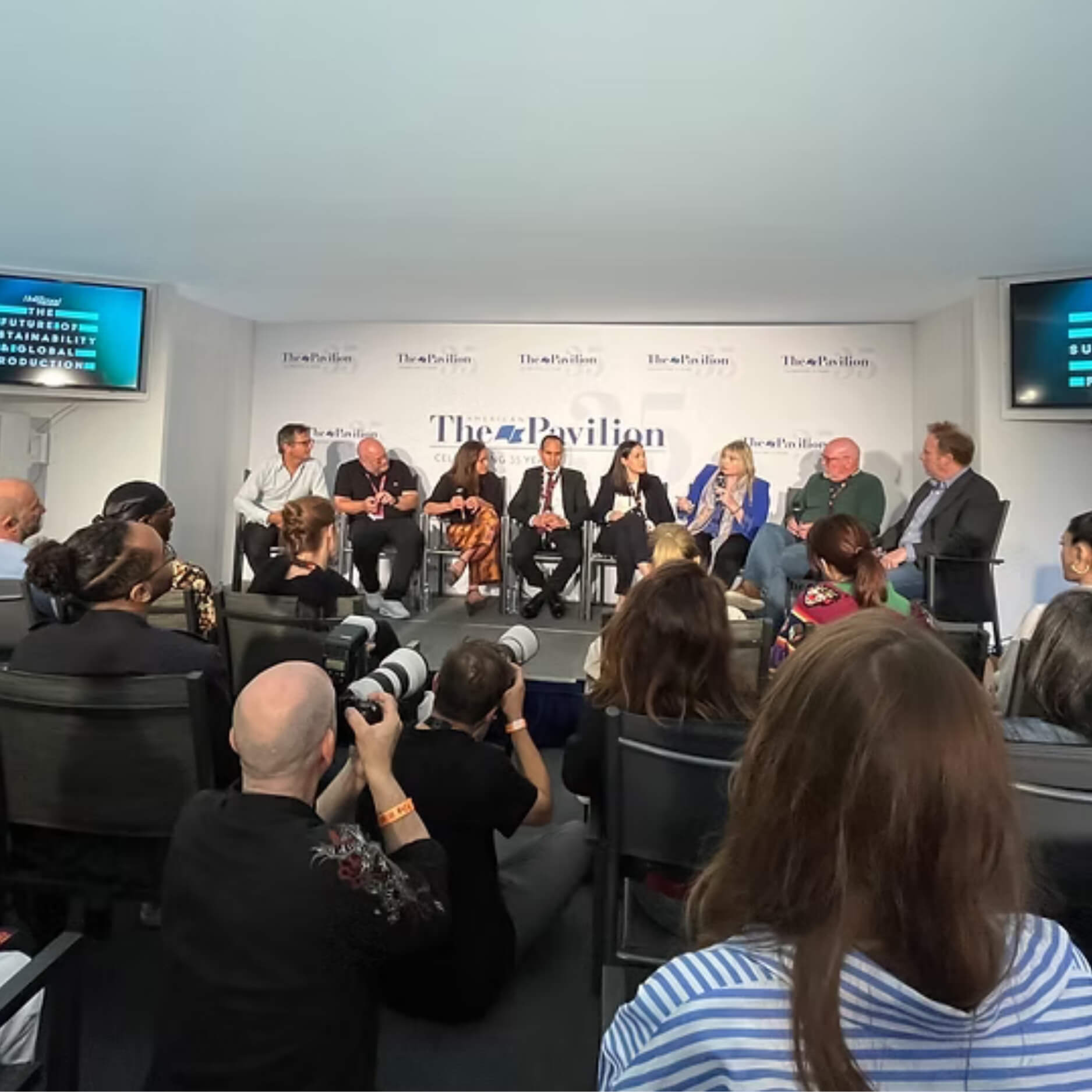 A photo of a film panel at the Cannes Film Festival.