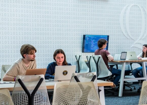 Students in a computer science classroom