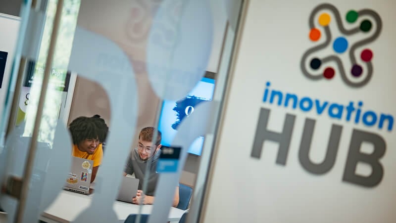Students collaborating in the Innovation Hub.
