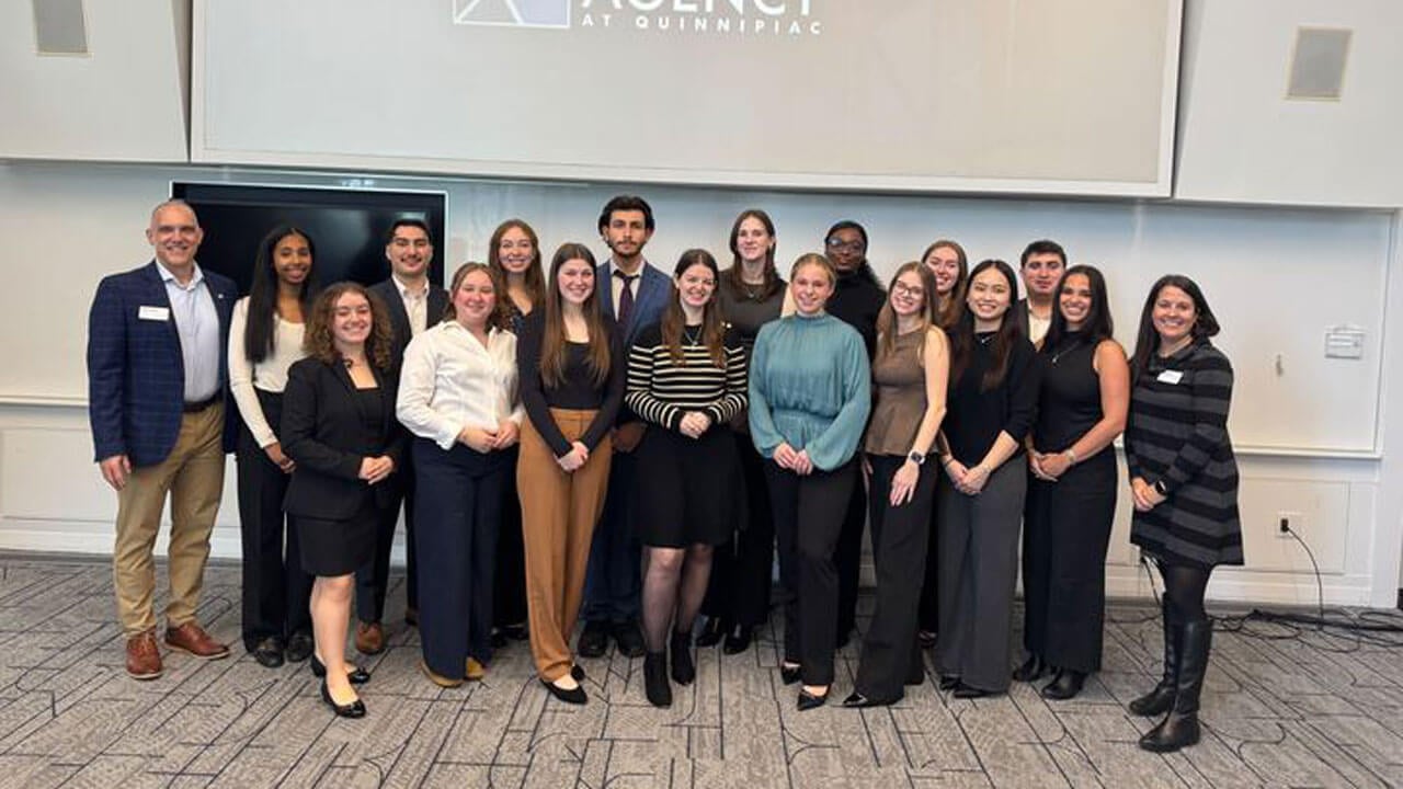 The Agency team poses for a photo